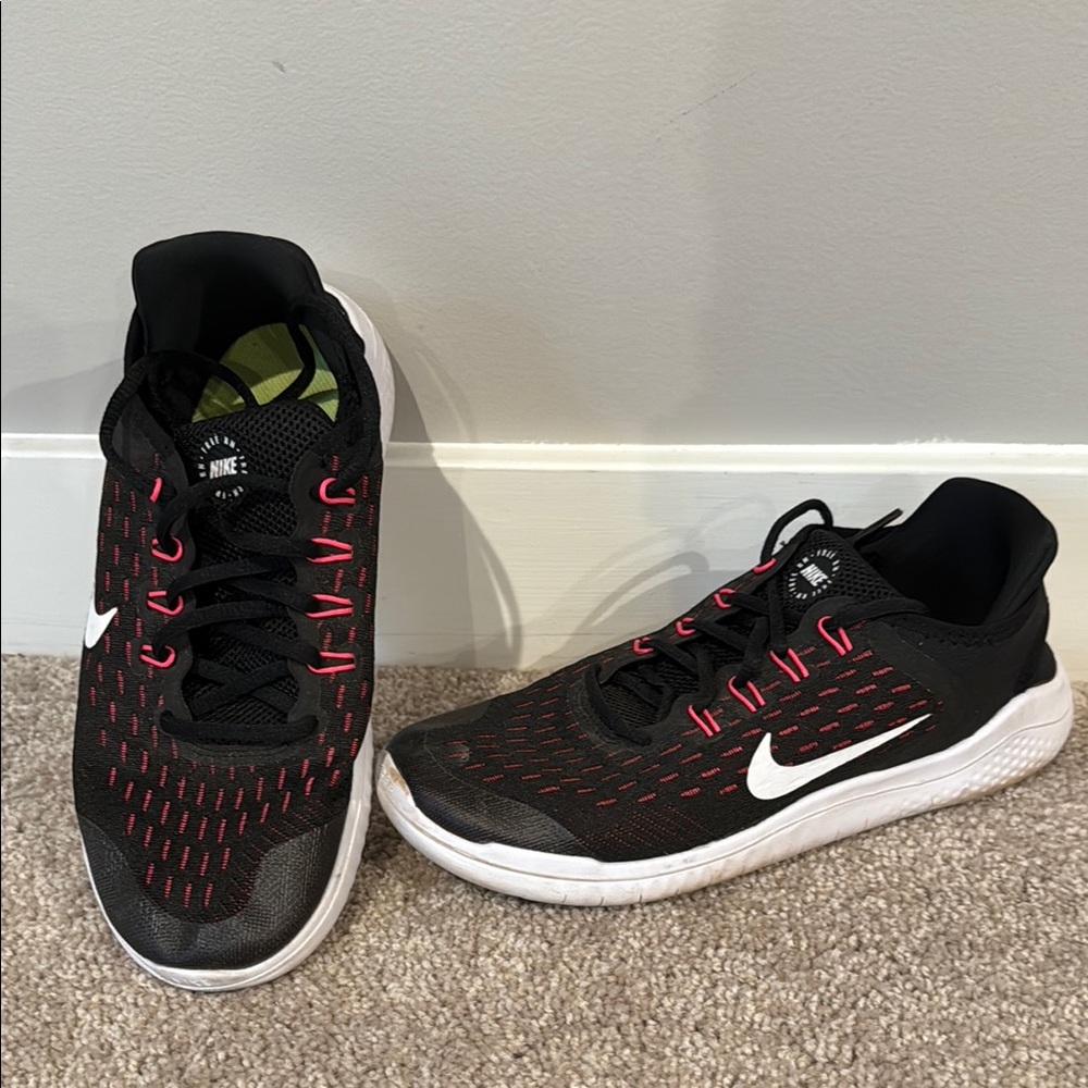 Black and White Athletic Shoes with pink Accents